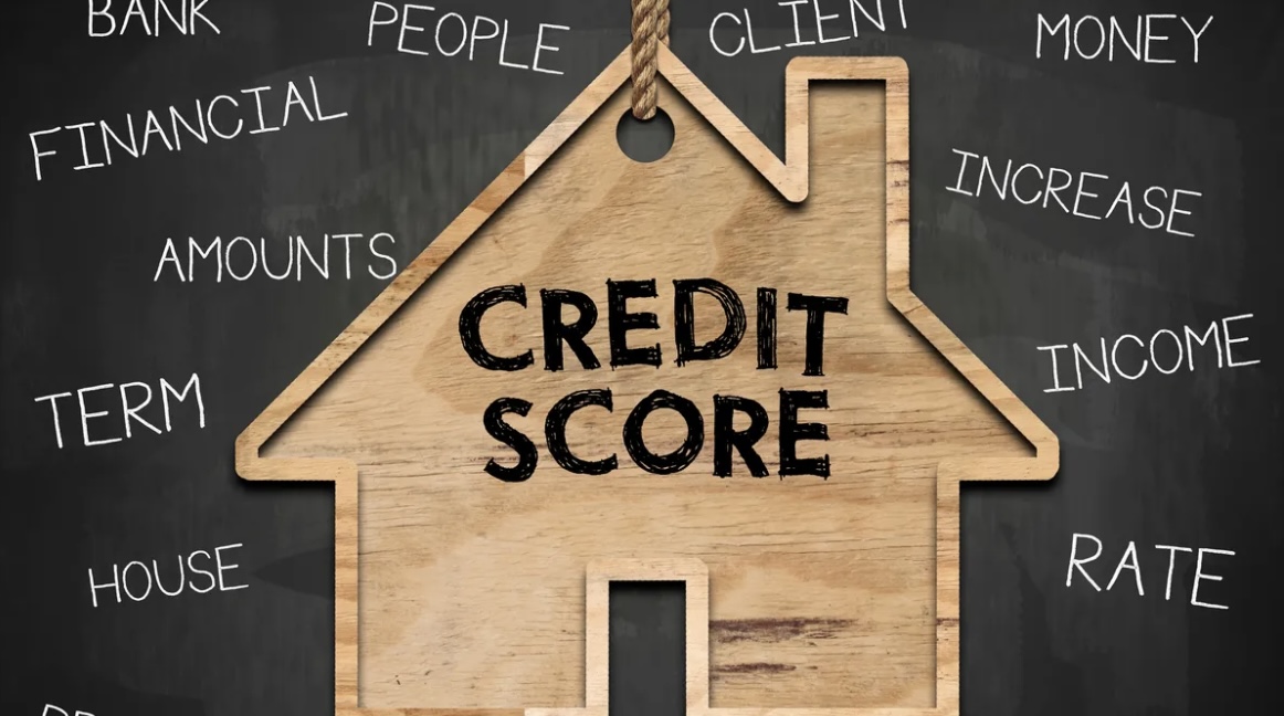 A key unlocking a door, symbolizing the importance of a good credit score in securing favorable financing for a home loan, as discussed in the blog post."